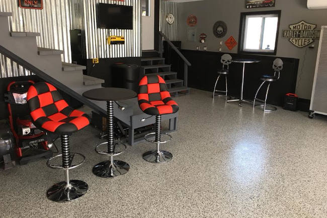 Flake epoxy floor in a garage hangout Houston