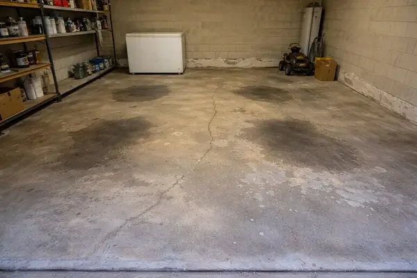 Bare concrete garage floor before epoxy coating in Houston